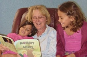 Ann Morris Reading to 2 Kids